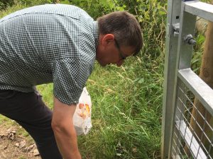 Fortunately, someone had left a carrier bag by the path so that Richard could fill it with rubbish!