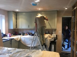 Fraser is painting the kitchen and dining room and Simon is still here ... obviously. It is getting there though.